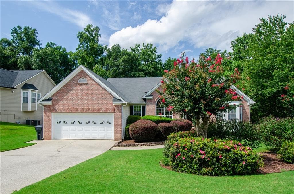 3 bedroom, 2 bathroom, 2,063 sq ft single family residence for sale at 2387 Ashbury Court, Buford, GA 30519 — photo 1 of 21