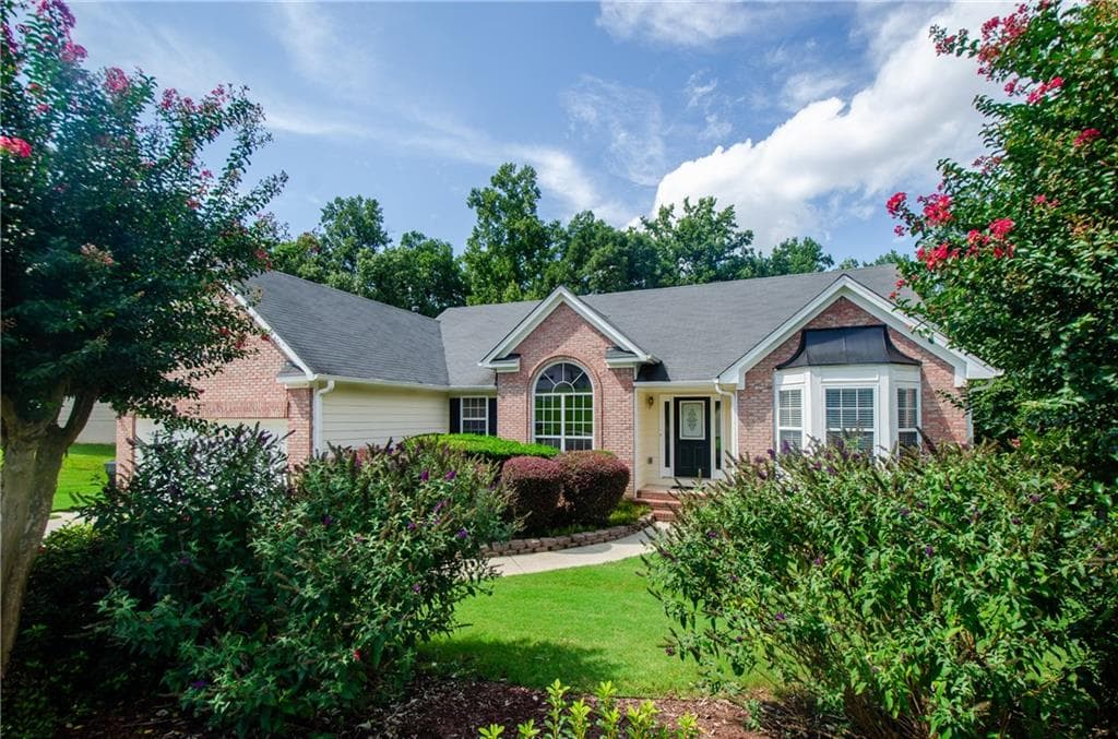 3 bedroom, 2 bathroom, 2,063 sq ft single family residence for sale at 2387 Ashbury Court, Buford, GA 30519 — photo 2
