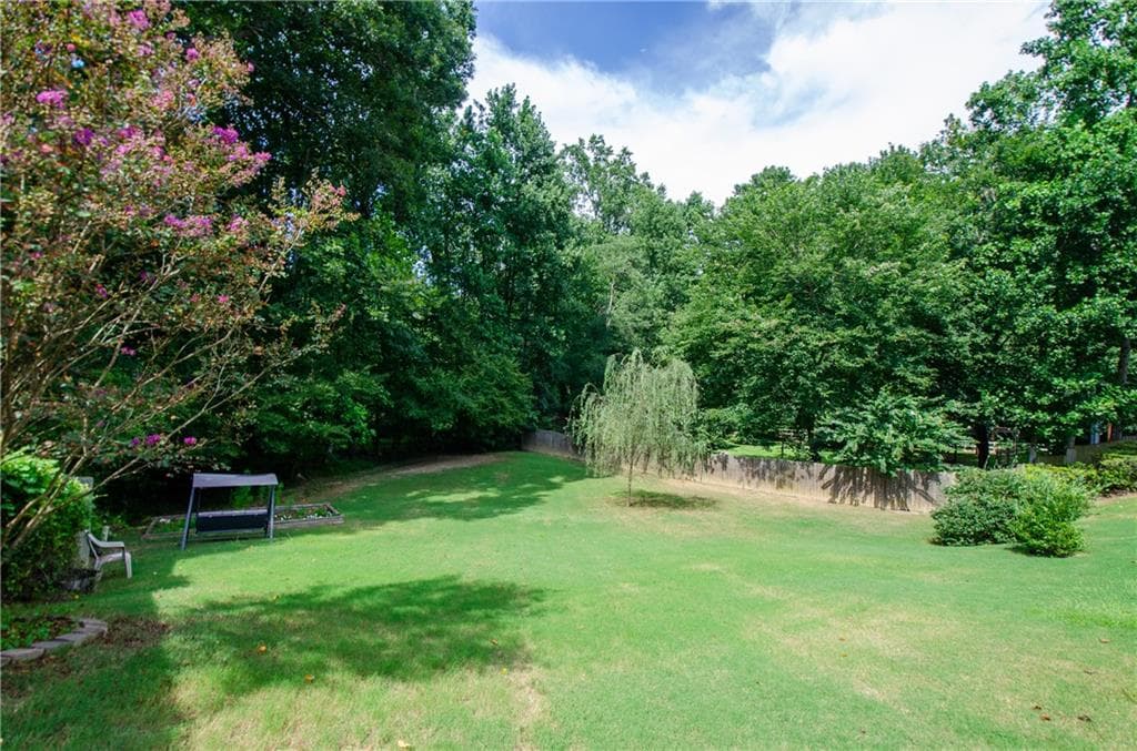 3 bedroom, 2 bathroom, 2,063 sq ft single family residence for sale at 2387 Ashbury Court, Buford, GA 30519 — photo 4