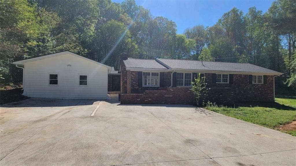 4 bedroom, 3 bathroom, 2,733 sq ft single family residence for sale at 5686 Woodland Drive, Acworth, GA 30102