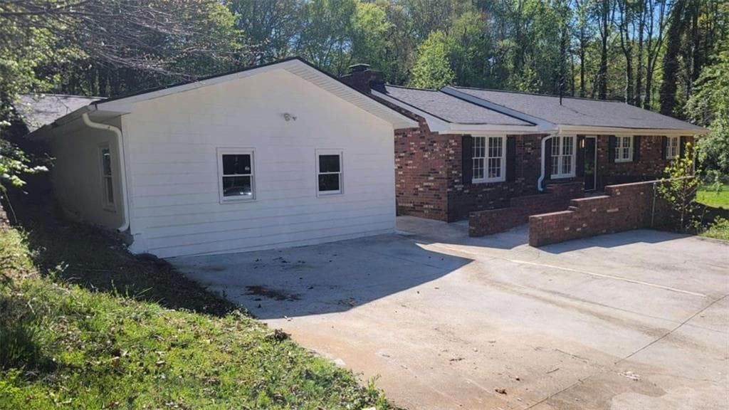 4 bedroom, 3 bathroom, 2,733 sq ft single family residence for sale at 5686 Woodland Drive, Acworth, GA 30102 — photo 4