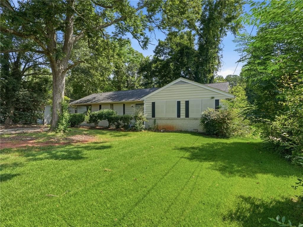 3 bedroom, 2 bathroom, 1,174 sq ft single family residence for sale at 1603 Hollyhock Terrace, Decatur, GA 30032 — photo 2