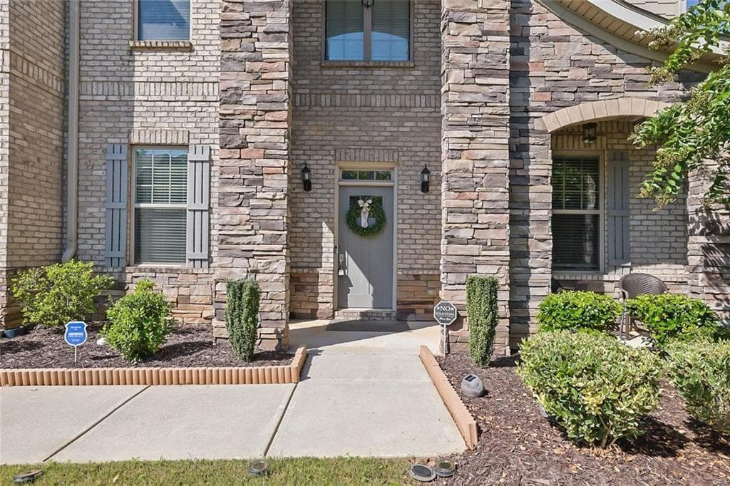 5 bedroom, 4 bathroom, 4,476 sq ft single family residence for sale at 4550 Point Rock Drive, Buford, GA 30519 — photo 3