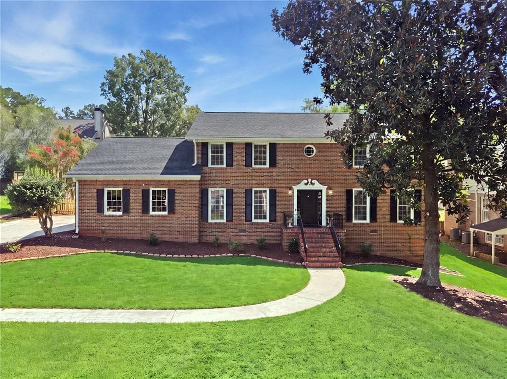 5 bedroom, 4 bathroom, 4,377 sq ft single family residence for sale at 5157 Lakesprings Drive, Dunwoody, GA 30338