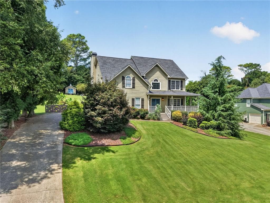 5 bedroom, 4 bathroom, 3,636 sq ft single family residence for sale at 4255 Fairfax Drive, Cumming, GA 30028 — photo 2