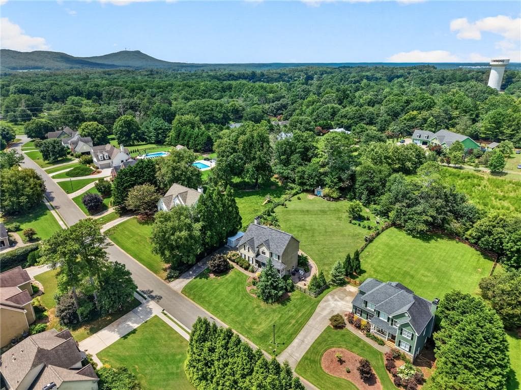 5 bedroom, 4 bathroom, 3,636 sq ft single family residence for sale at 4255 Fairfax Drive, Cumming, GA 30028 — photo 5