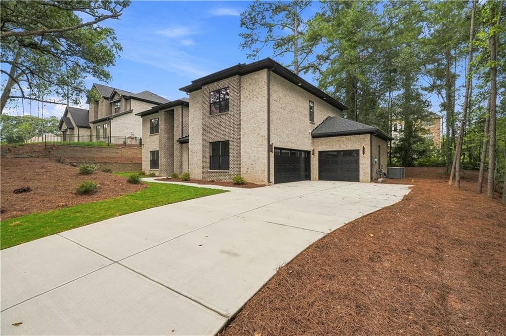 5 bedroom, 5 bathroom, 4,086 sq ft single family residence for sale at 922 Artistry Way, Fairburn, GA 30213 — photo 3