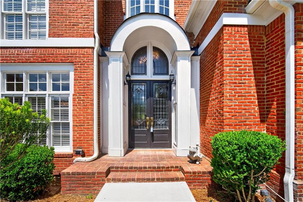 6 bedroom, 7 bathroom, 6,921 sq ft single family residence for sale at 1838 Ballybunion Drive, Johns Creek, GA 30097 — photo 2