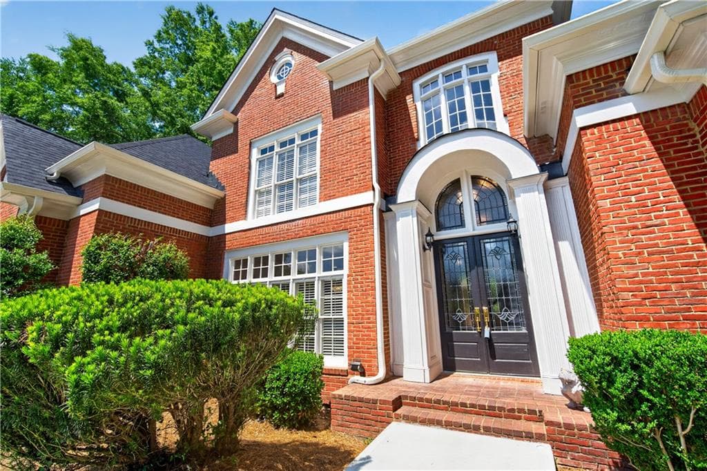 6 bedroom, 7 bathroom, 6,921 sq ft single family residence for sale at 1838 Ballybunion Drive, Johns Creek, GA 30097 — photo 3