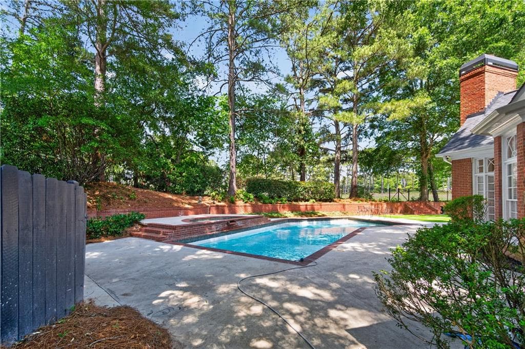 6 bedroom, 7 bathroom, 6,921 sq ft single family residence for sale at 1838 Ballybunion Drive, Johns Creek, GA 30097 — photo 5