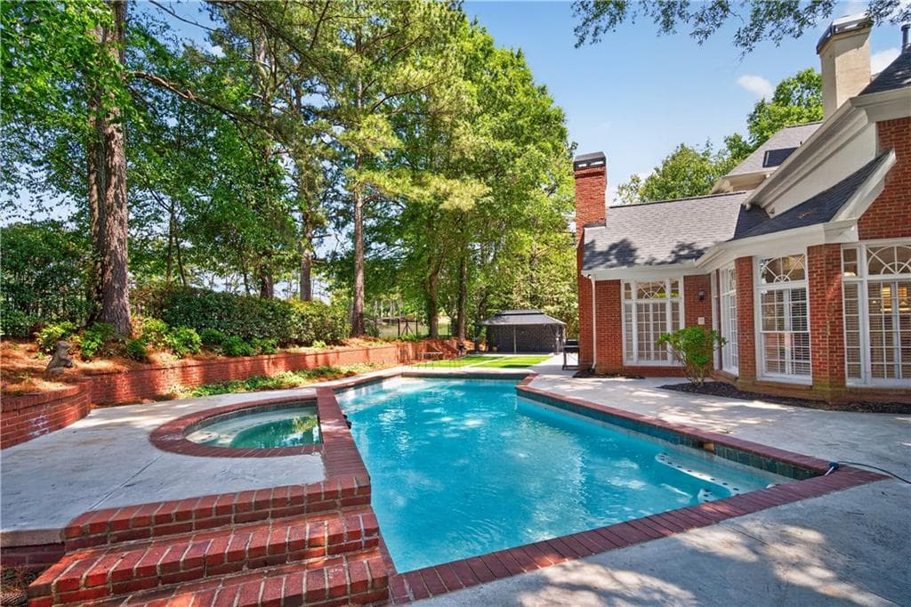 6 bedroom, 7 bathroom, 6,921 sq ft single family residence for sale at 1838 Ballybunion Drive, Johns Creek, GA 30097 — photo 6