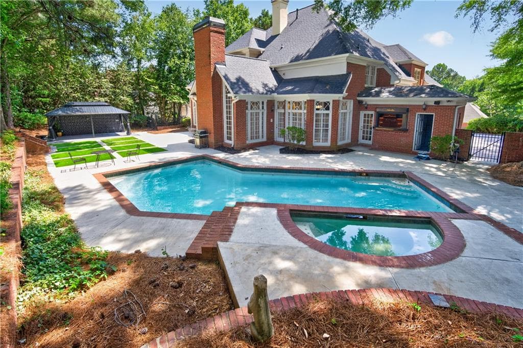 6 bedroom, 7 bathroom, 6,921 sq ft single family residence for sale at 1838 Ballybunion Drive, Johns Creek, GA 30097 — photo 7