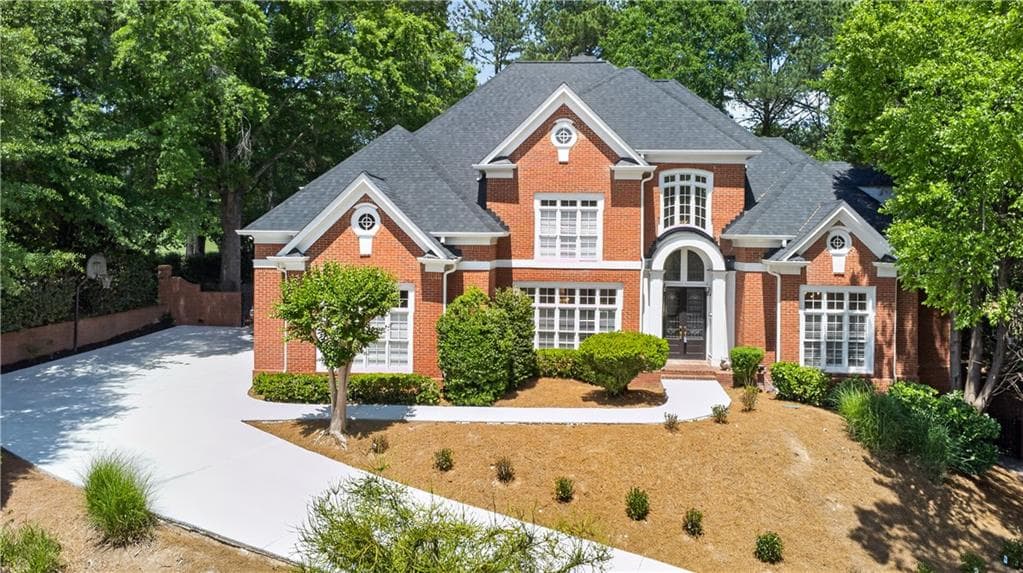 6 bedroom, 7 bathroom, 6,921 sq ft single family residence for sale at 1838 Ballybunion Drive, Johns Creek, GA 30097