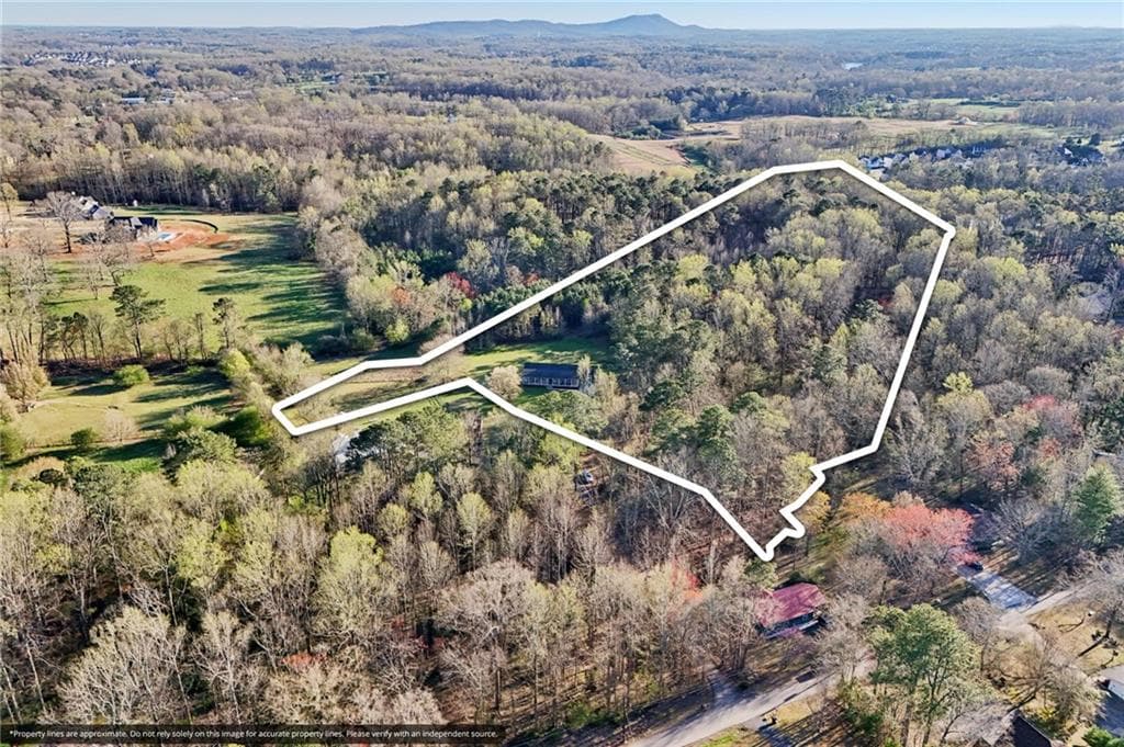 5 bedroom, 3 bathroom, 3,660 sq ft single family residence for sale at 6471 Forsyth Drive, Cumming, GA 30028 — photo 2