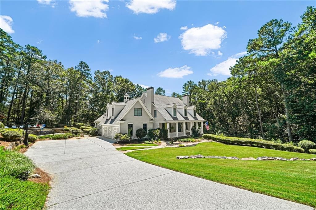 7 bedroom, 5 bathroom, 6,431 sq ft single family residence for sale at 1525 Rabke Road, Canton, GA 30114 — photo 4
