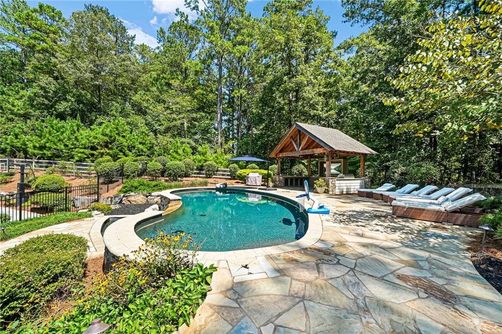 7 bedroom, 5 bathroom, 6,431 sq ft single family residence for sale at 1525 Rabke Road, Canton, GA 30114 — photo 6