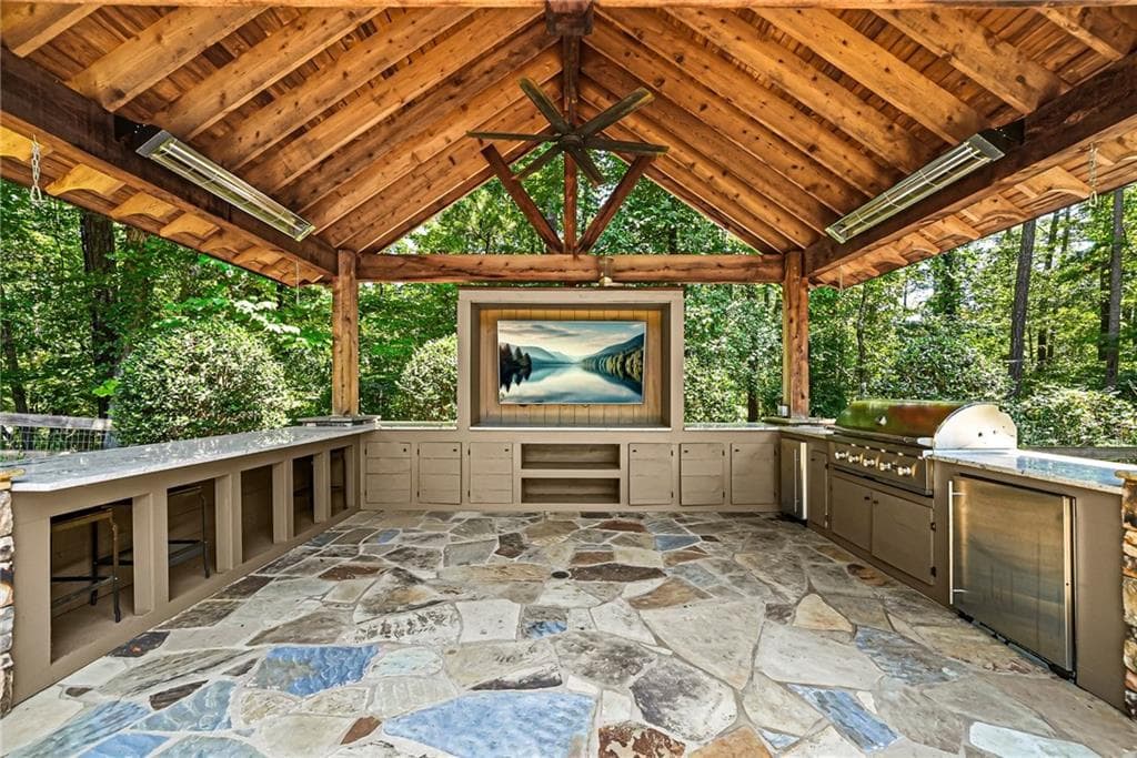 7 bedroom, 5 bathroom, 6,431 sq ft single family residence for sale at 1525 Rabke Road, Canton, GA 30114 — photo 7