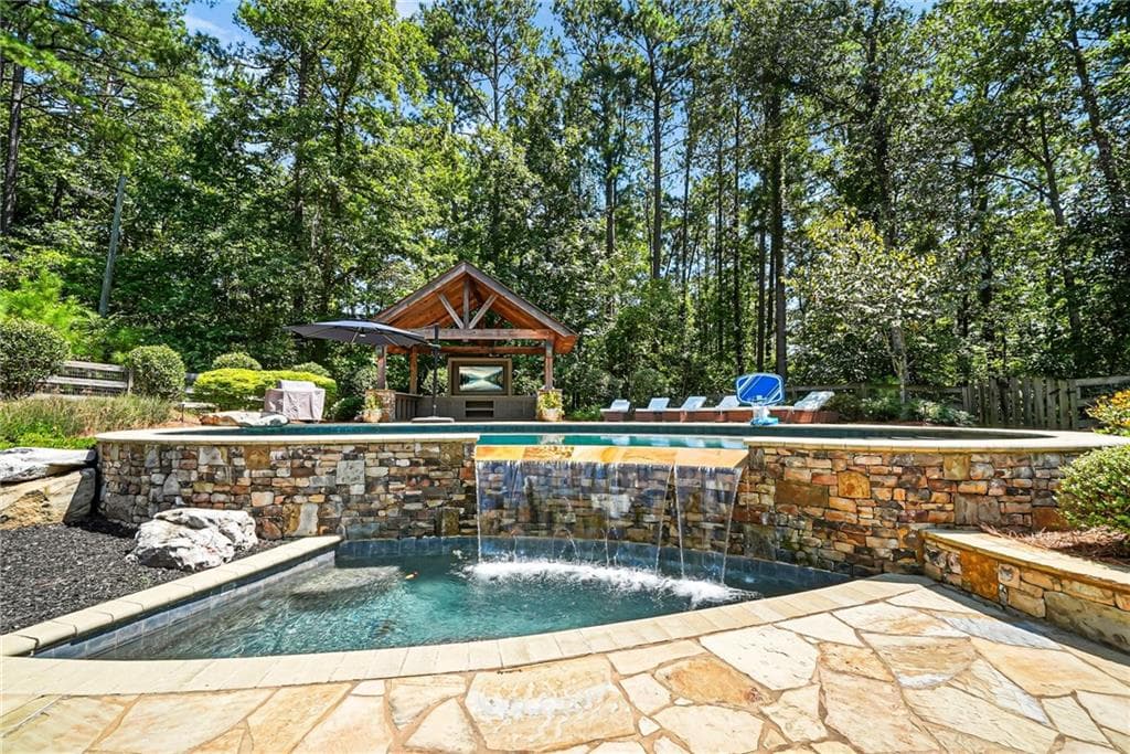 7 bedroom, 5 bathroom, 6,431 sq ft single family residence for sale at 1525 Rabke Road, Canton, GA 30114 — photo 8