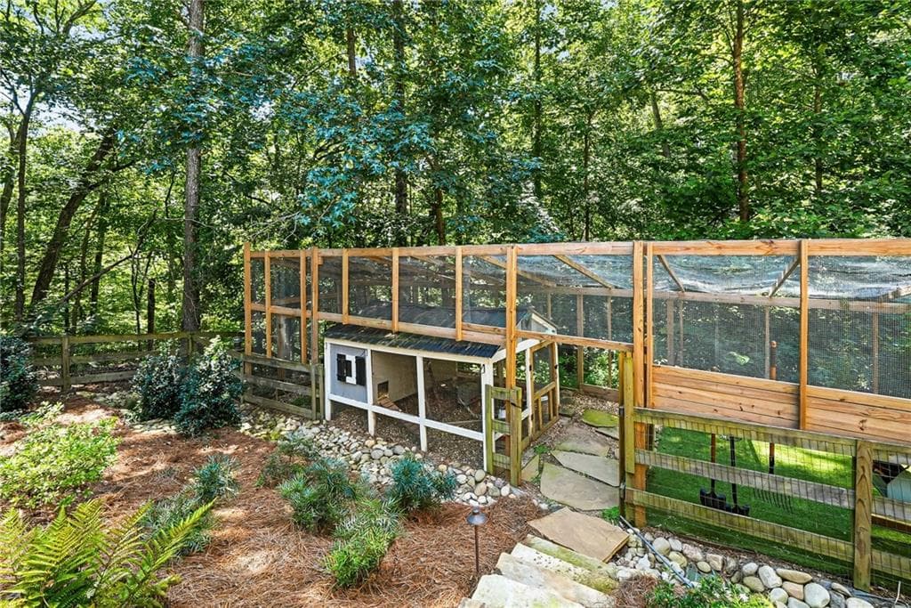 7 bedroom, 5 bathroom, 6,431 sq ft single family residence for sale at 1525 Rabke Road, Canton, GA 30114 — photo 9
