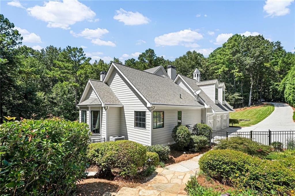 7 bedroom, 5 bathroom, 6,431 sq ft single family residence for sale at 1525 Rabke Road, Canton, GA 30114 — photo 5