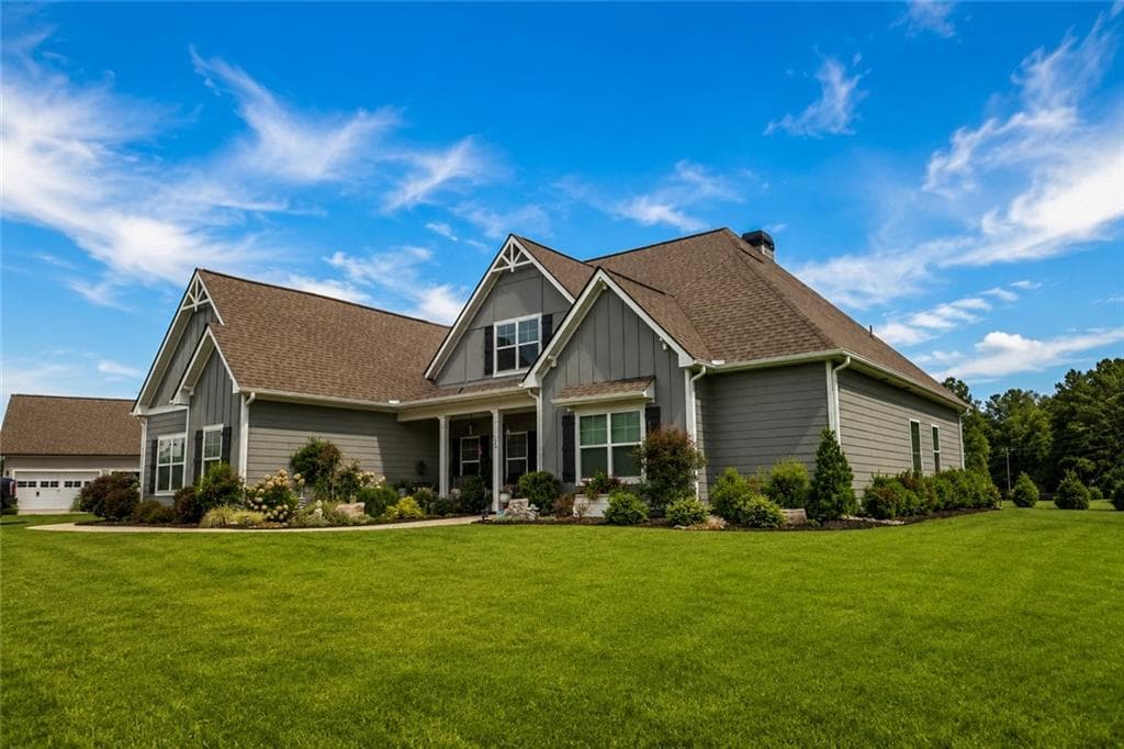 5 bedroom, 4 bathroom, 3,754 sq ft single family residence for sale at 394 Bluff Mill Farms Drive, Senoia, GA 30276 — photo 2