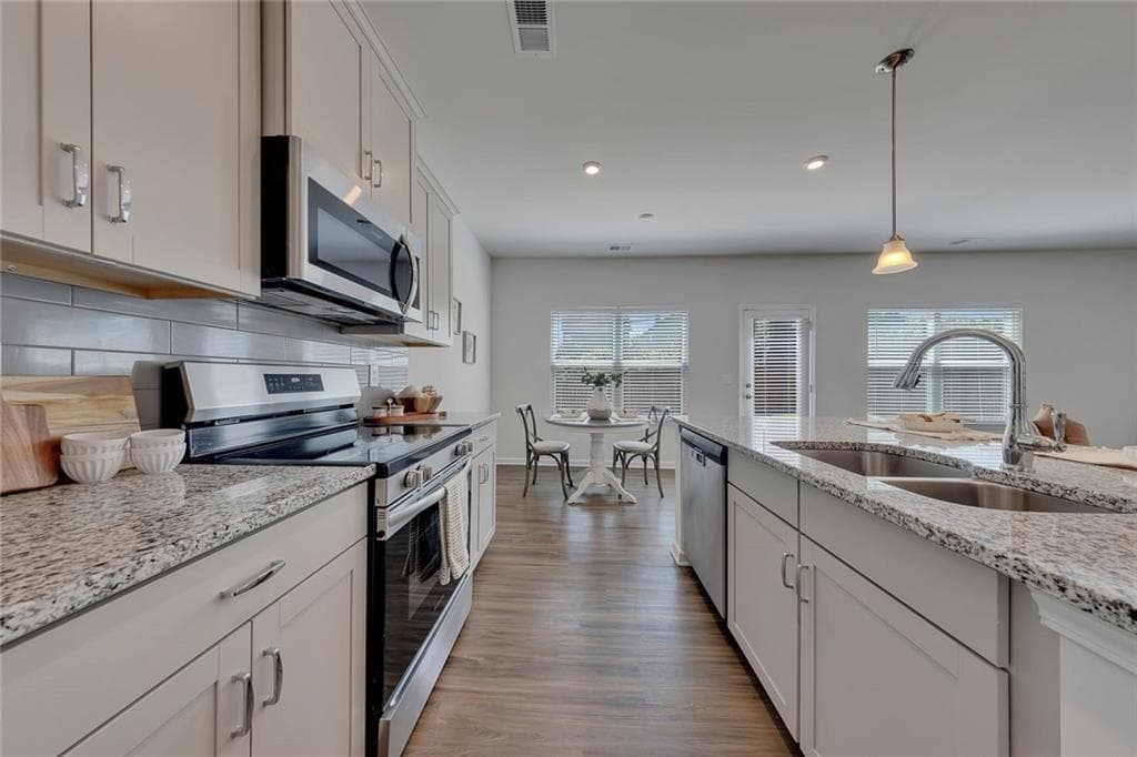 4 bedroom, 3 bathroom, 2,220 sq ft single family residence for sale at 350 Cranston Drive, Ball Ground, GA 30107 — photo 8
