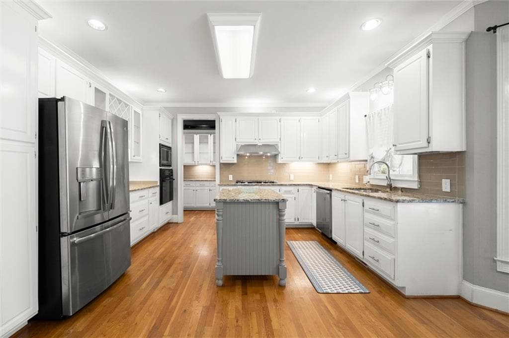 6 bedroom, 4 bathroom, 3,936 sq ft single family residence for sale at 5020 Hamptons Club Drive, Alpharetta, GA 30004 — photo 8