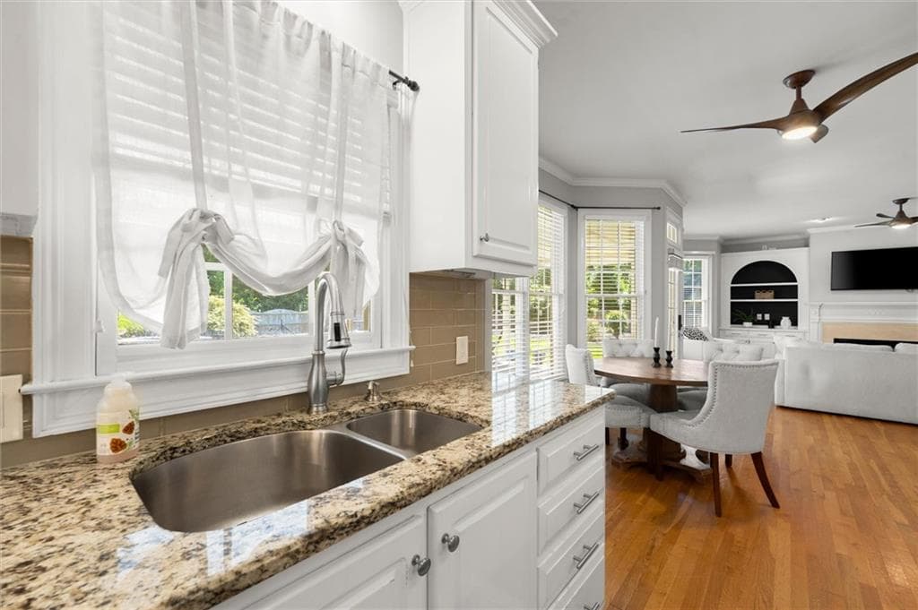 6 bedroom, 4 bathroom, 3,936 sq ft single family residence for sale at 5020 Hamptons Club Drive, Alpharetta, GA 30004 — photo 10