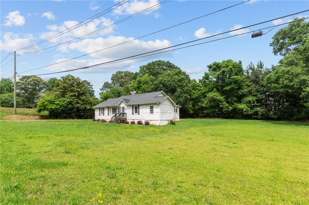 2 bedroom, 2 bathroom, 1,756 sq ft single family residence for sale at 641 Highway 23, Suwanee, GA 30024 — photo 3