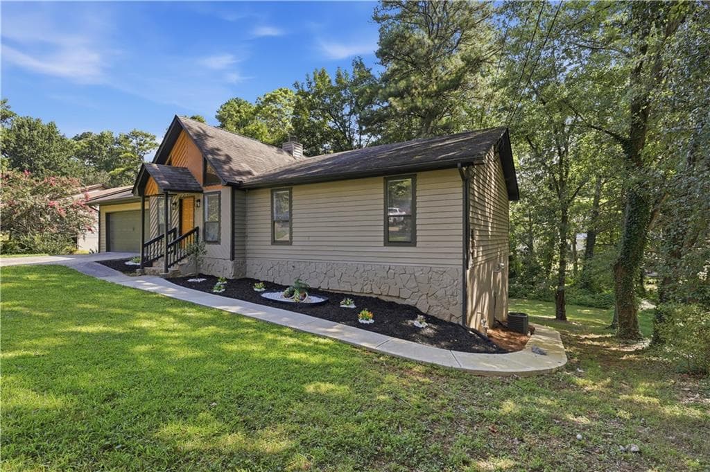 4 bedroom, 3 bathroom, 2,819 sq ft single family residence for sale at 78 Regal way northwest Way, Lawrenceville, GA 30044 — photo 2