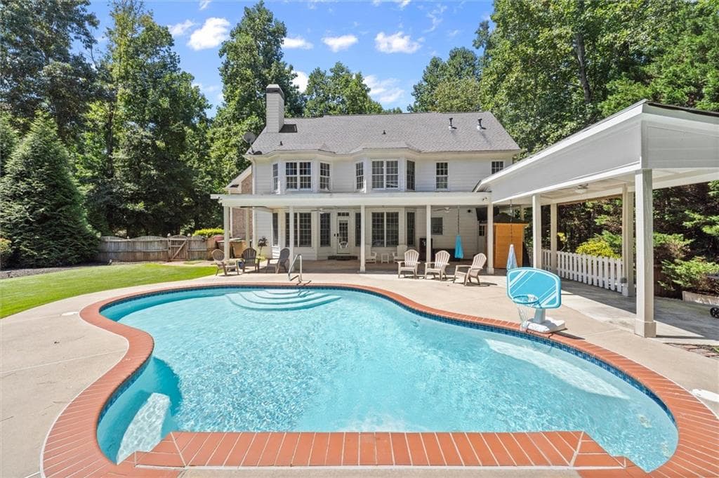 6 bedroom, 4 bathroom, 3,936 sq ft single family residence for sale at 5020 Hamptons Club Drive, Alpharetta, GA 30004 — photo 2