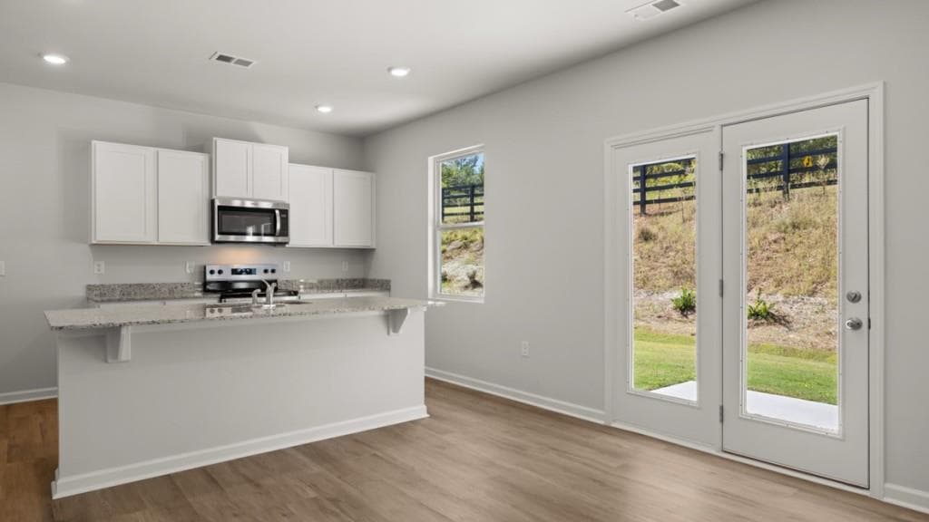 4 bedroom, 3 bathroom, 1,991 sq ft single family residence for sale at 3880 Donetta Drive, Atlanta, GA 30349 — photo 5
