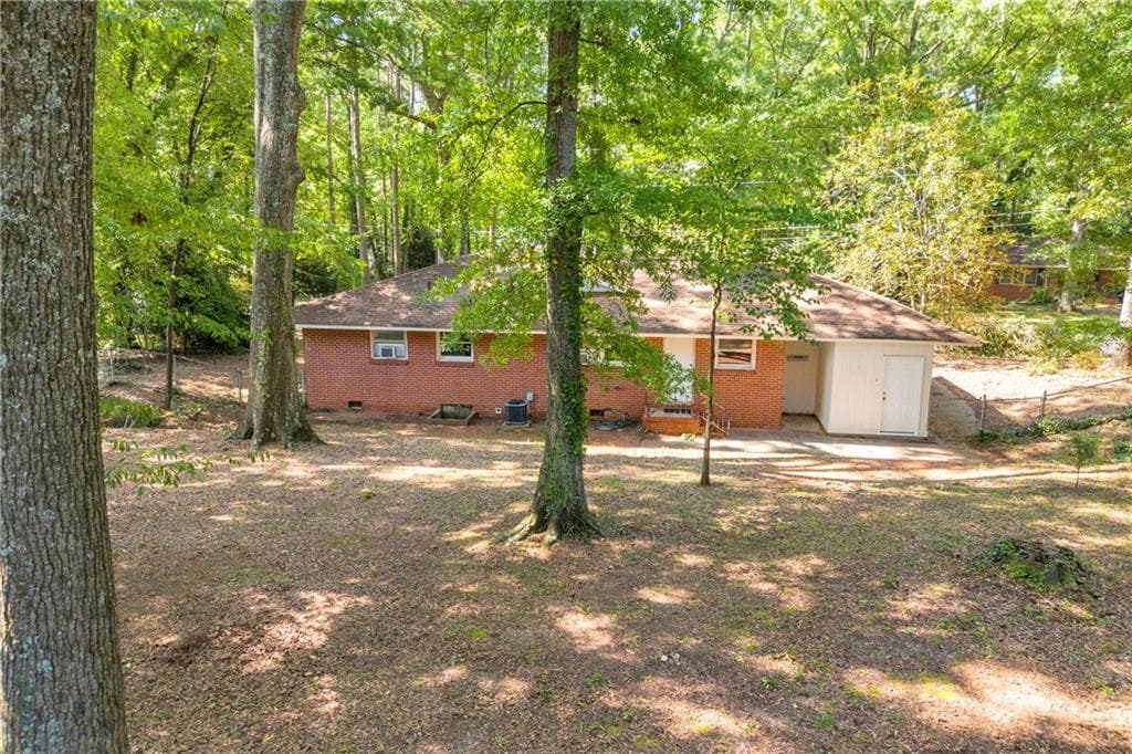 3 bedroom, 2 bathroom, 1,742 sq ft single family residence for sale at 402 Woodland Road, Monroe, GA 30655 — photo 6