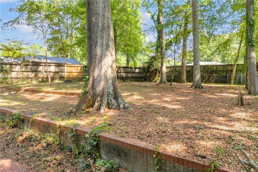 3 bedroom, 2 bathroom, 1,742 sq ft single family residence for sale at 402 Woodland Road, Monroe, GA 30655 — photo 9
