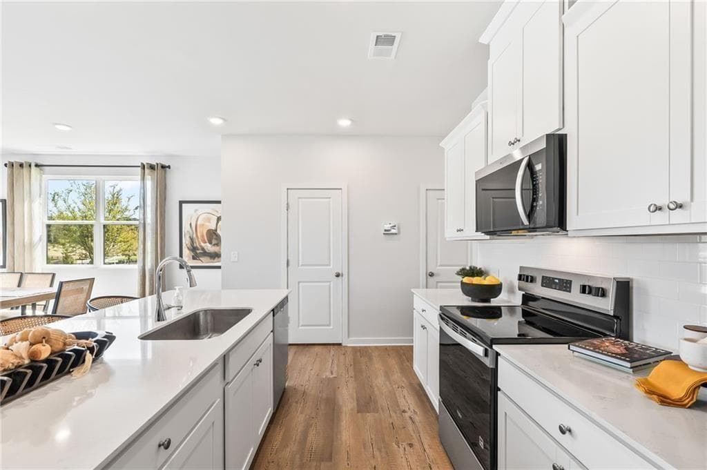 3 bedroom, 3 bathroom, 1,855 sq ft townhouse for sale at 1231 Brooks Ryan Run 85, Lawrenceville, GA 30043 — photo 3