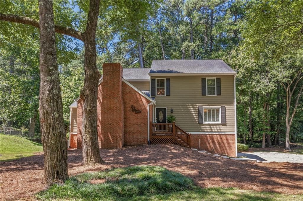 4 bedroom, 3 bathroom, 3,343 sq ft single family residence for sale at 2369 North Forest Drive, Marietta, GA 30062 — photo 1 of 38