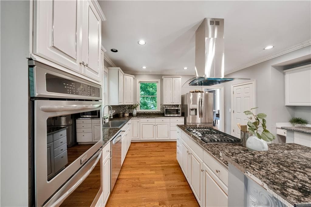 6 bedroom, 4 bathroom, 4,254 sq ft single family residence for sale at 3405 Duckpond Trace, Duluth, GA 30096 — photo 4