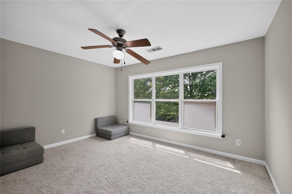 4 bedroom, 3 bathroom, 2,988 sq ft single family residence for sale at 5040 Fieldstone View Circle, Cumming, GA 30028 — photo 4