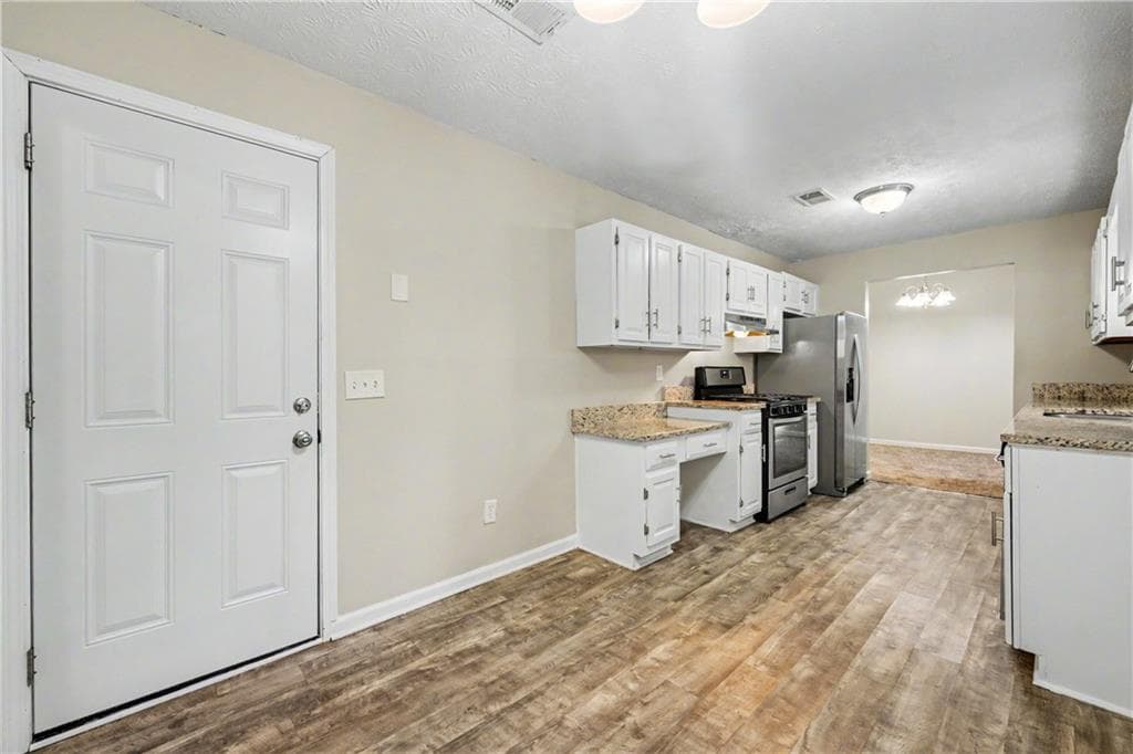 3 bedroom, 2 bathroom, 1,360 sq ft single family residence for sale at 2692 Ansley Way, Lawrenceville, GA 30044 — photo 7