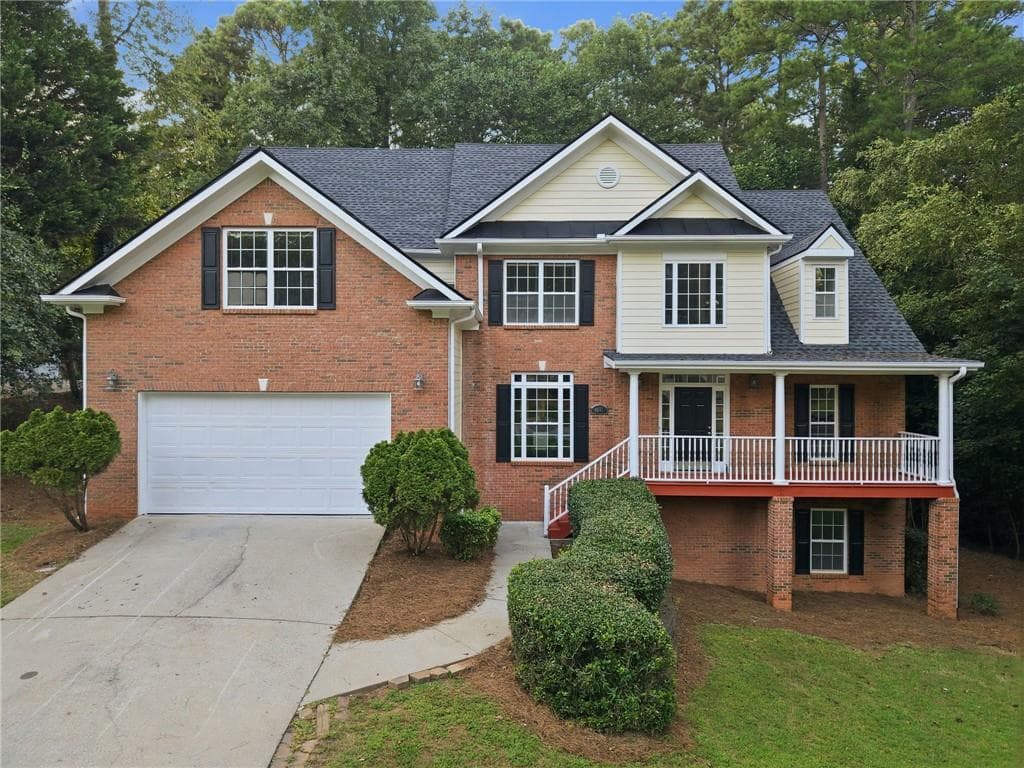 5 bedroom, 3 bathroom, 3,186 sq ft single family residence for sale at 4085 Howell Ferry Road, Duluth, GA 30096 — photo 2