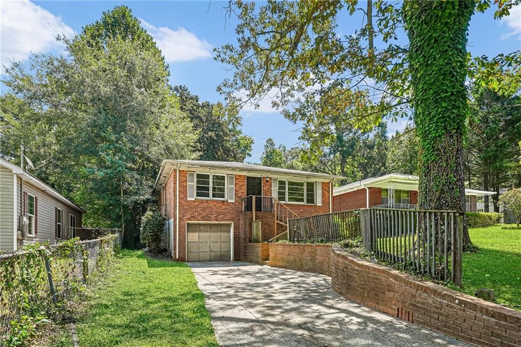 4 bedroom, 2 bathroom, 1,488 sq ft single family residence for sale at 1329 Nash Road, Atlanta, GA 30331 — photo 2
