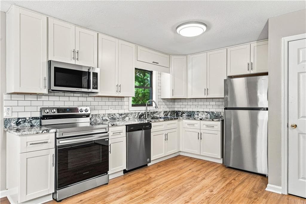 3 bedroom, 2 bathroom, 1,212 sq ft single family residence for sale at 3824 Wyntuck Circle, Kennesaw, GA 30152 — photo 4