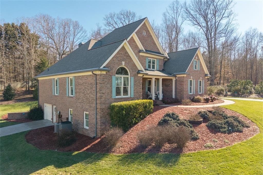 4 bedroom, 4 bathroom, 5,774 sq ft single family residence for sale at 8015 Hurakan Creek Crossing, Cumming, GA 30028 — photo 4