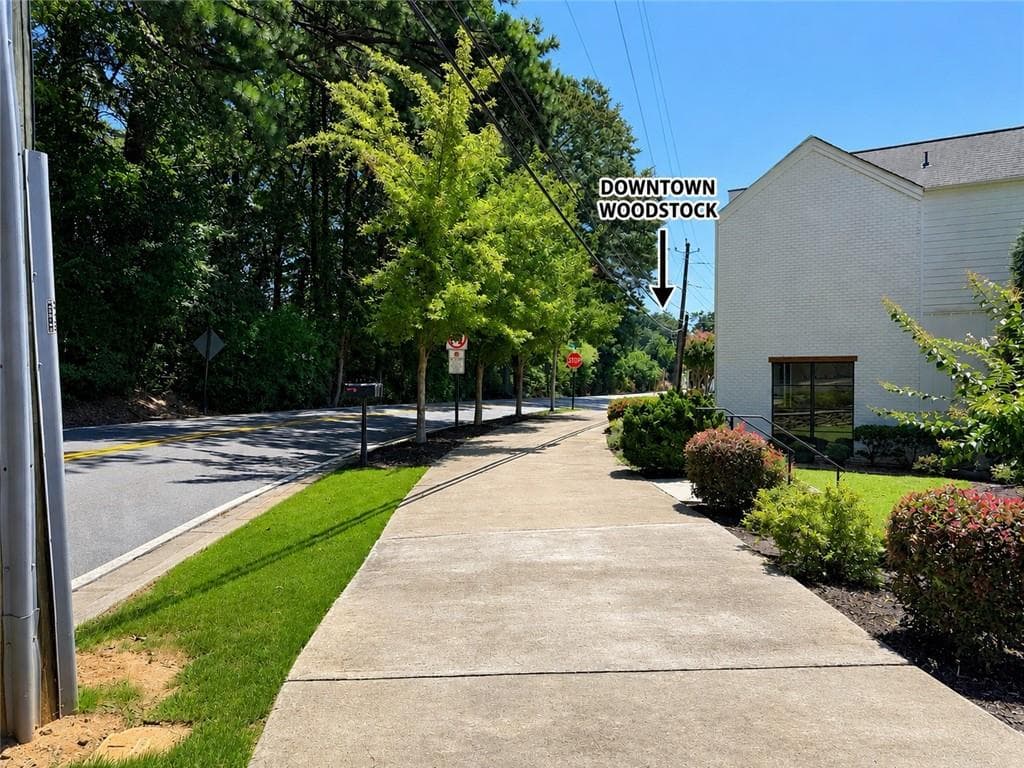 4 bedroom, 5 bathroom, 3,609 sq ft single family residence for sale at 304 Woodstock Seven Drive, Woodstock, GA 30188 — photo 6