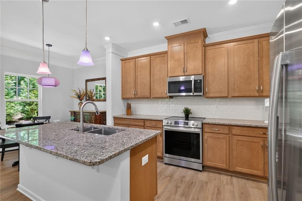 3 bedroom, 3 bathroom, 1,874 sq ft townhouse for sale at 144 Town Walk Drive, Holly Springs, GA 30115 — photo 6