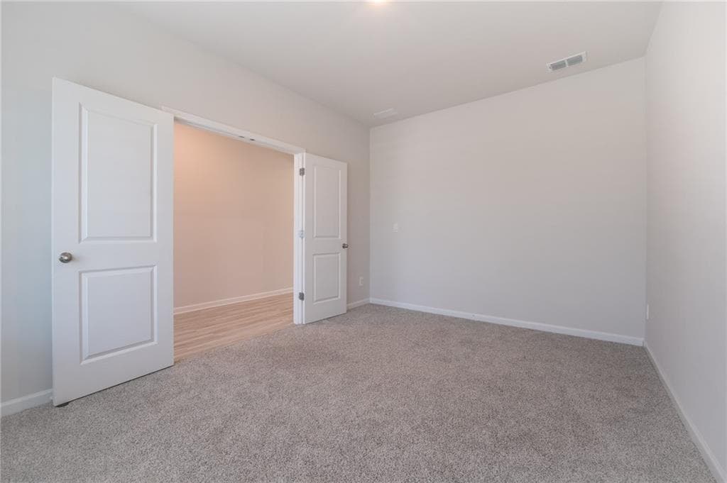 4 bedroom, 3 bathroom, 2,632 sq ft single family residence for sale at 3774 Commodore Court, Buford, GA 30519 — photo 4