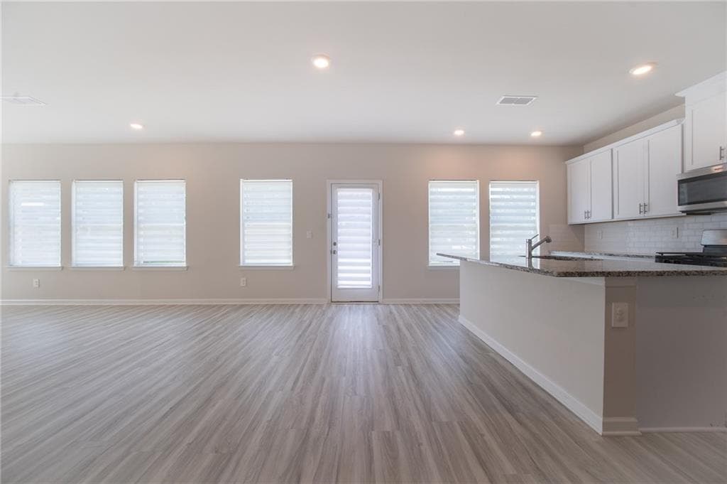 4 bedroom, 3 bathroom, 2,632 sq ft single family residence for sale at 3774 Commodore Court, Buford, GA 30519 — photo 5