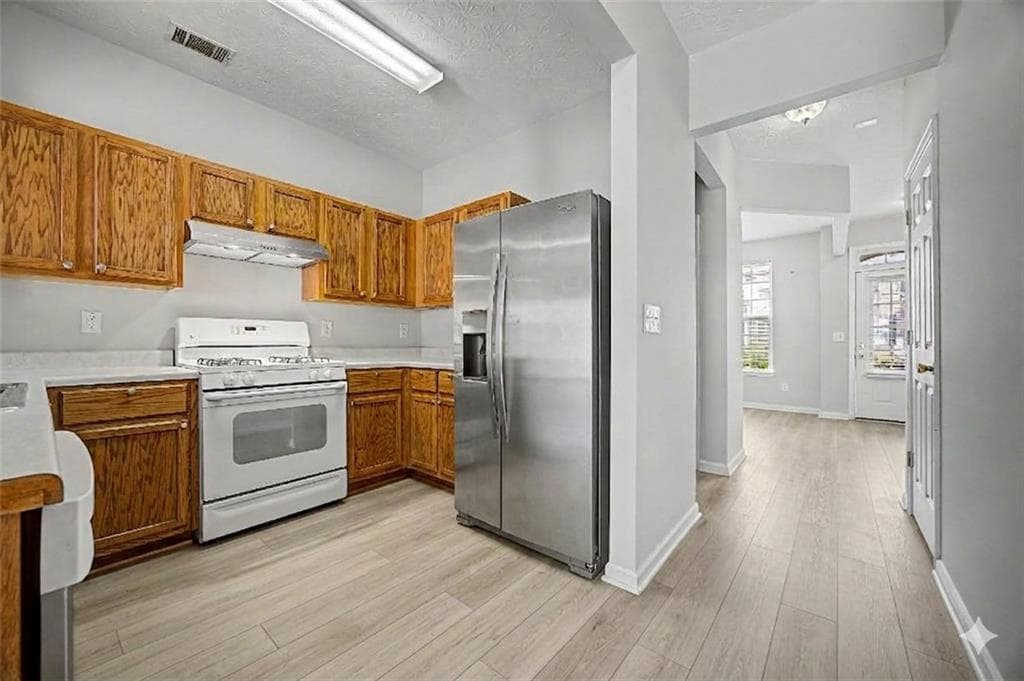 2 bedroom, 3 bathroom, 1,398 sq ft townhouse for rent at 1212 Penhurst Way, Lawrenceville, GA 30043 for $1,850 a month — photo 2