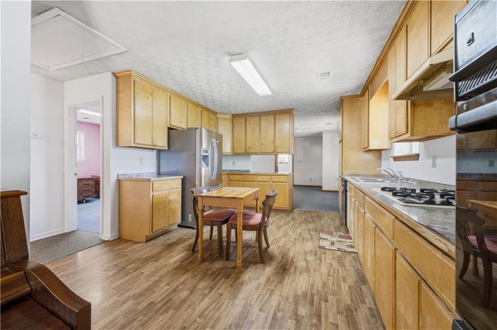 4 bedroom, 2 bathroom, 2,055 sq ft single family residence for sale at 4805 S Highway 27, Lindale, GA 30147 — photo 6
