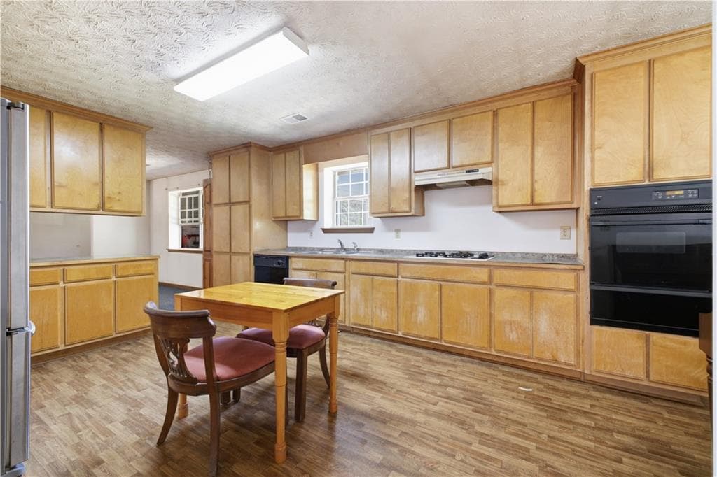 4 bedroom, 2 bathroom, 2,055 sq ft single family residence for sale at 4805 S Highway 27, Lindale, GA 30147 — photo 7